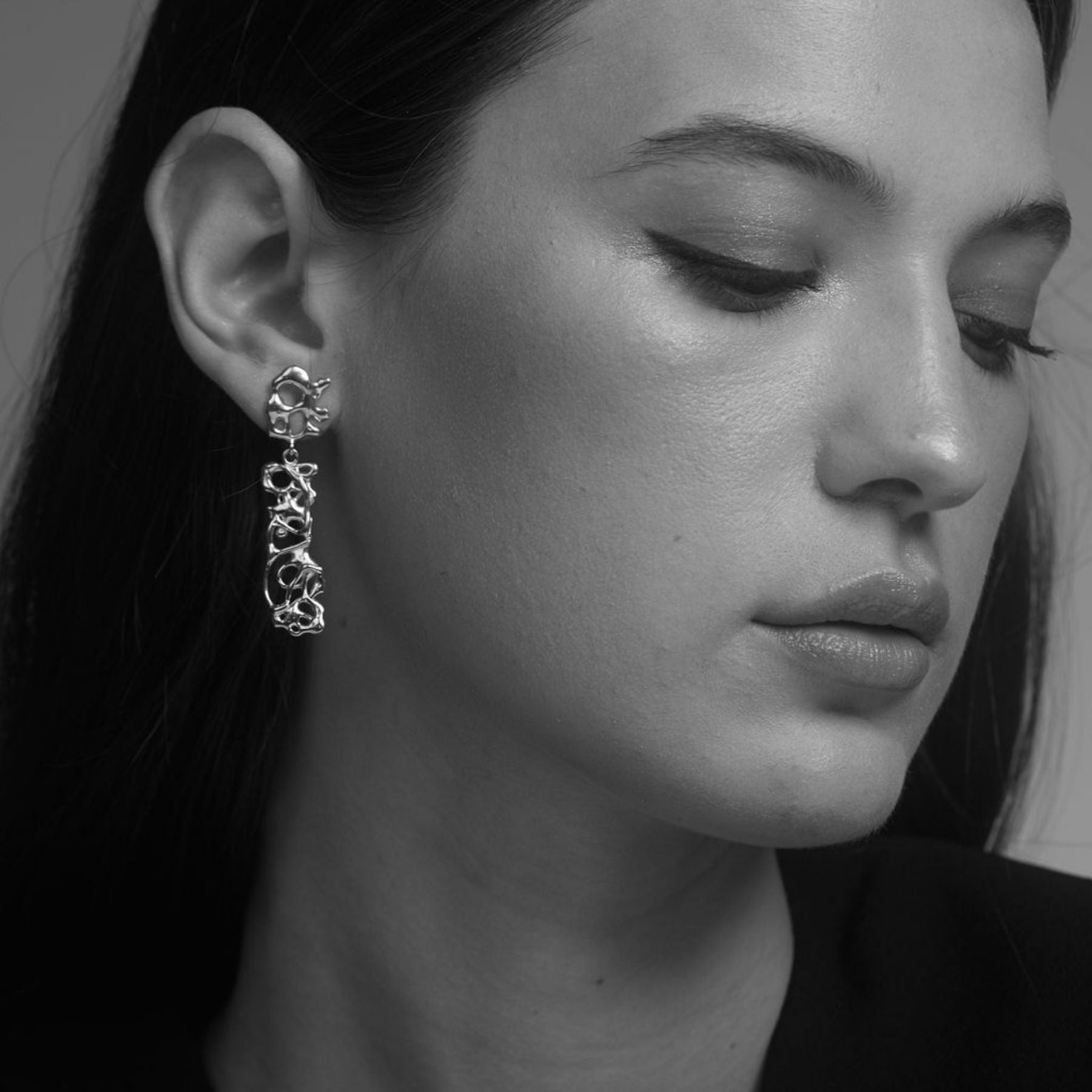 Abstract, squiggle asymmetrical dangling earrings in 18k gold vermeil.