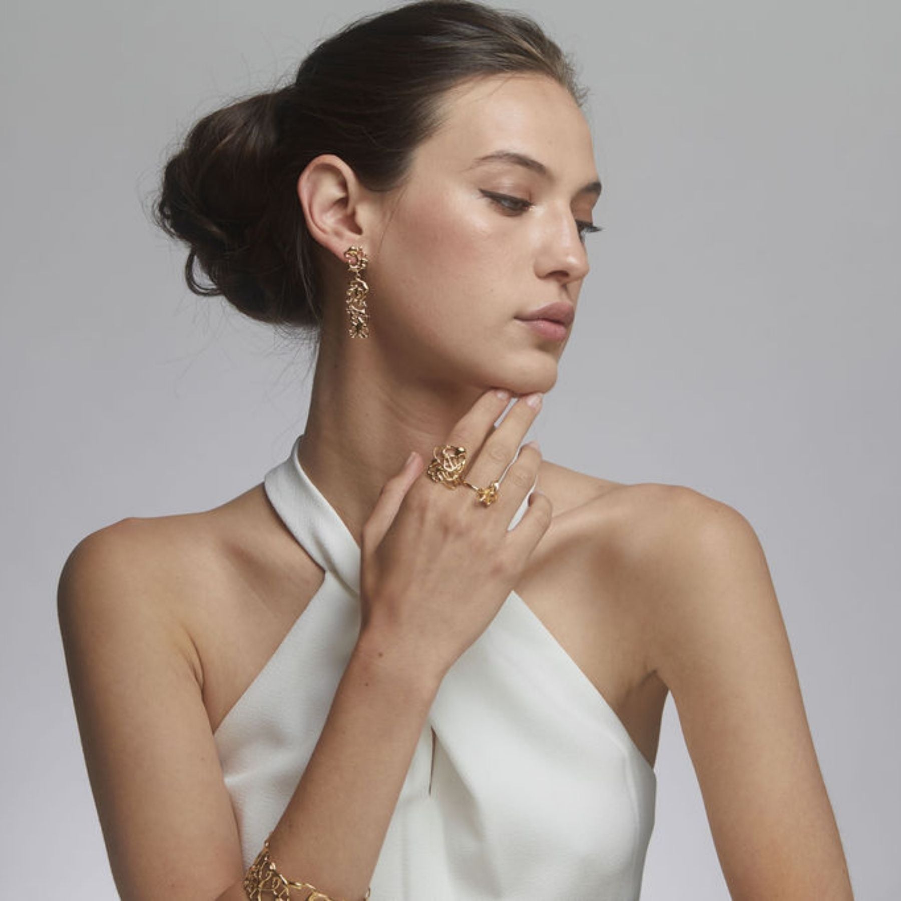 Abstract, squiggle asymmetrical dangling earrings in 18k gold vermeil.