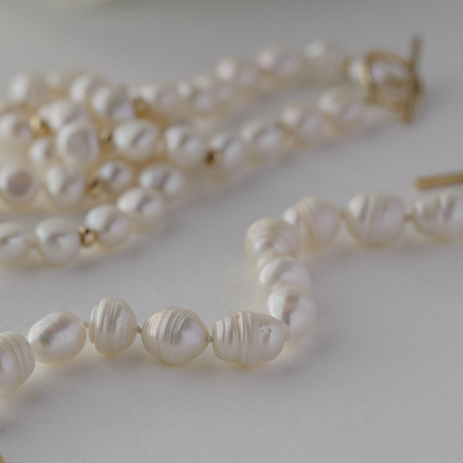 Freshwater cultured potato pearl bracelet with a 14k gold-filled toggle clasp.