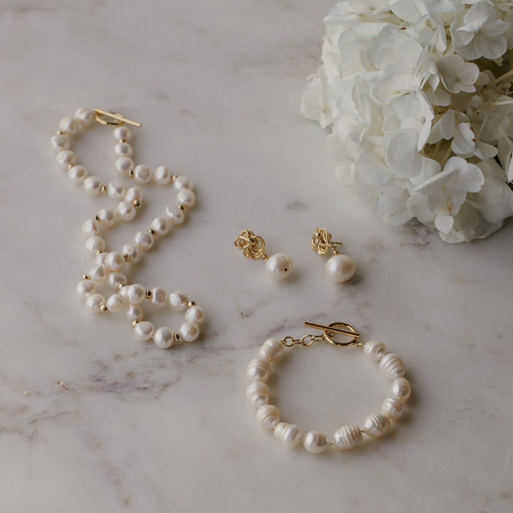 Freshwater cultured potato pearl bracelet with a 14k gold-filled toggle clasp.