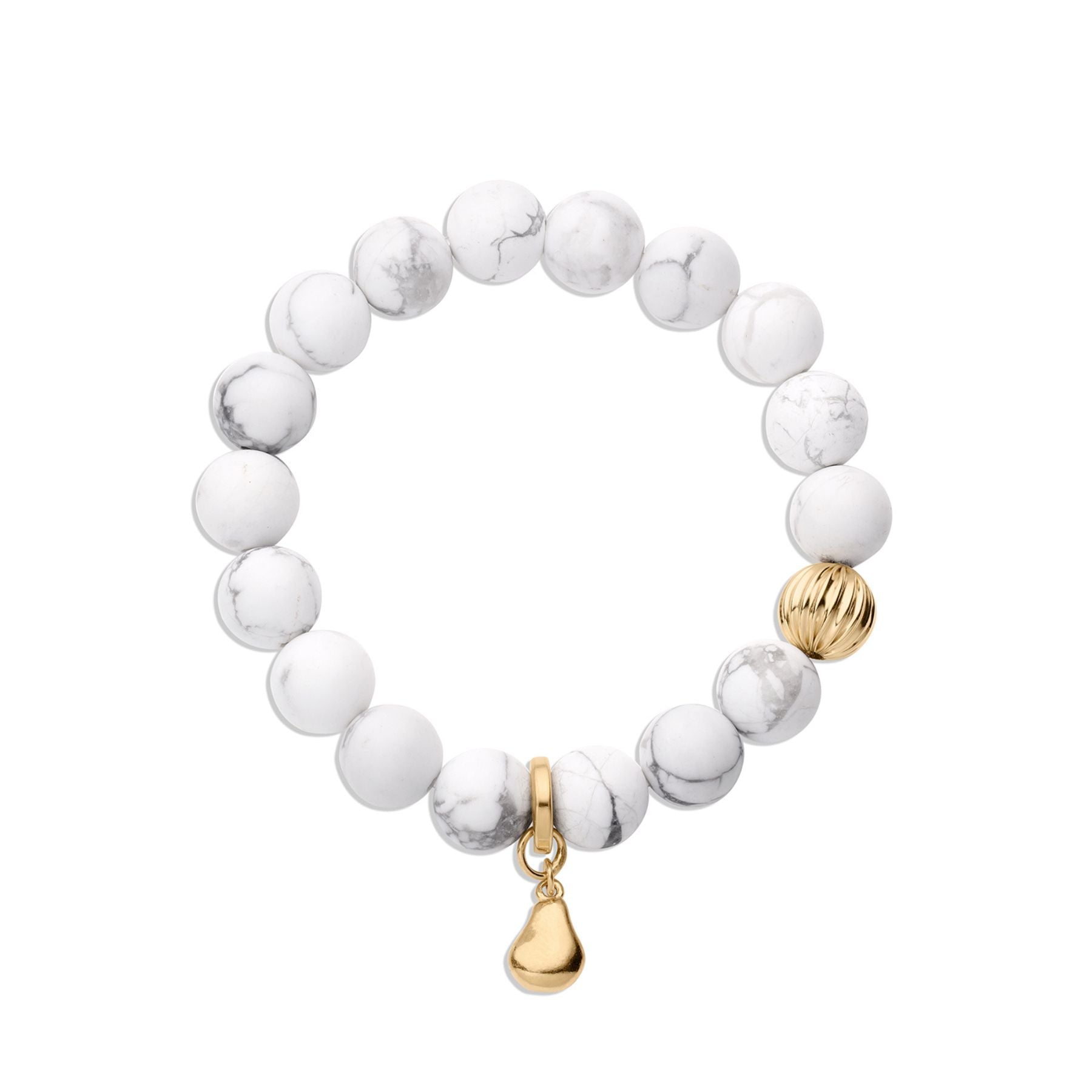 Howlite beaded bracelet with corrugated gold accent bead and gold pear charm.