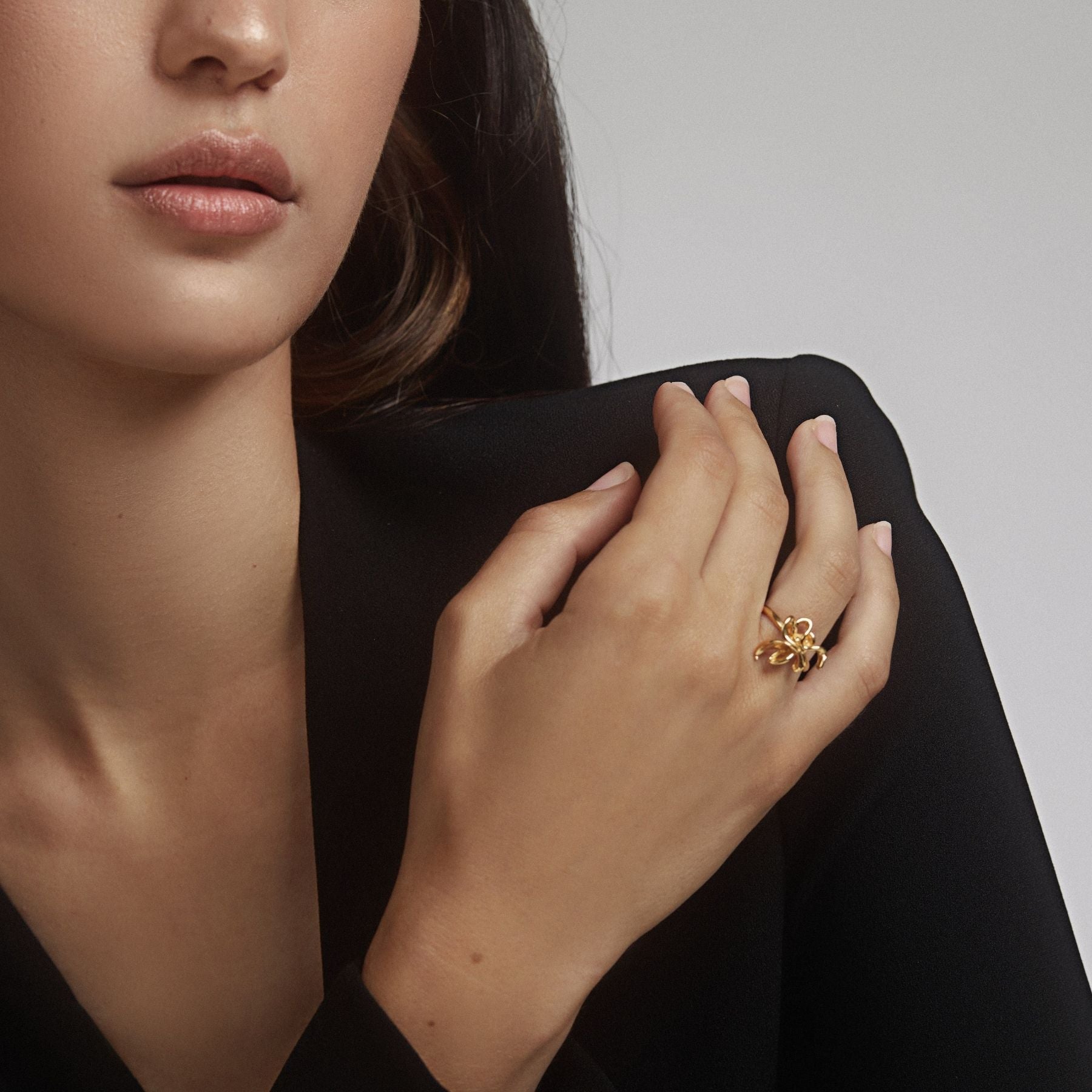 Delicate abstract lily flower ring with a thin band in 18k gold vermeil.