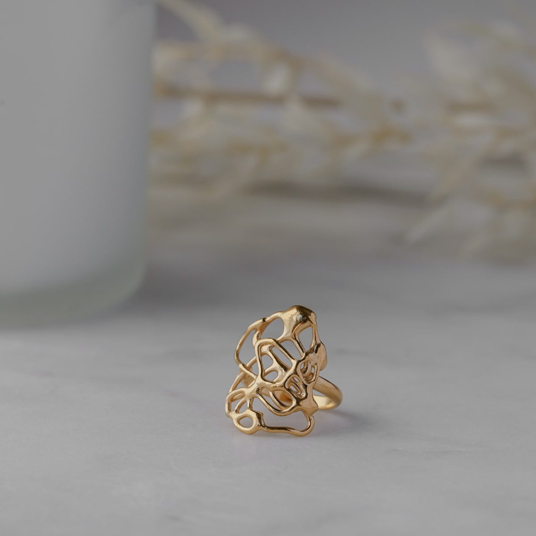Abstract, squiggle statement cocktail ring in 18k gold vermeil.